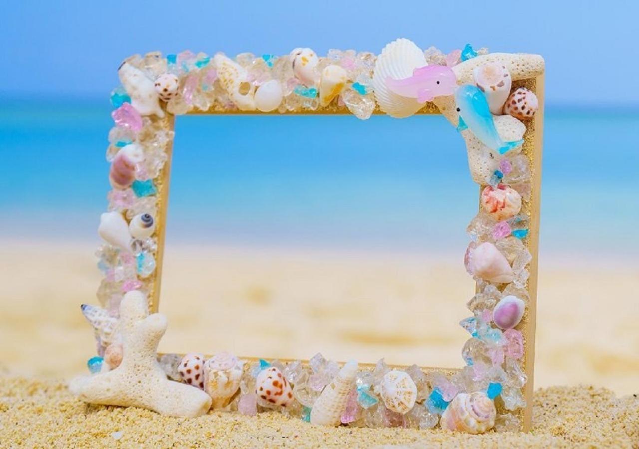 Hotel Monterey Okinawa Spa & Resort Онна Екстер'єр фото A seashell frame